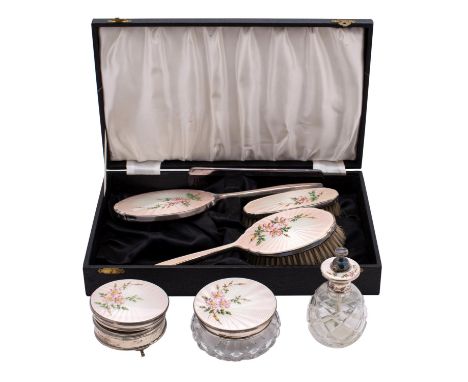 An Elizabeth II silver and enamel matched dressing table set, maker Adie Brothers, various dates, includes hair brush, clothe