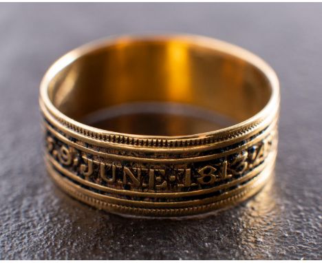 A Georgian black enamel mourning ring, the enamel spelling out 'J FENN OB 9 JUNE 1813 AET 31', with hallmarks for 1813, ring 