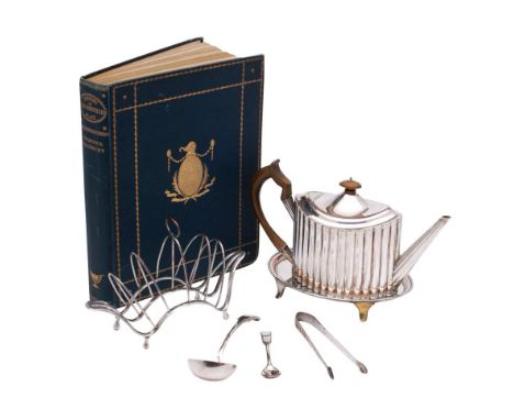 A late 18th century Sheffield Plate teapot of oval reeded outline, together with a Sheffield Plate teapot stand, crested, of 