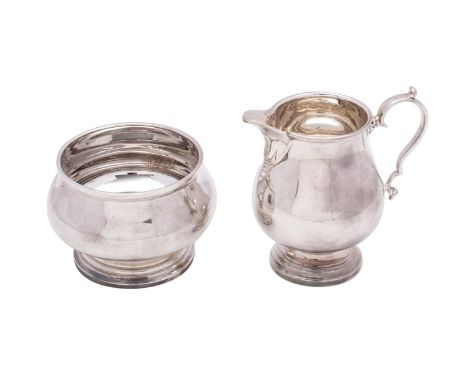 An Elizabeth II silver part tea service, maker Elkington &amp; Co, Birmingham, 1966/68 of plain baluster form, raised on circ