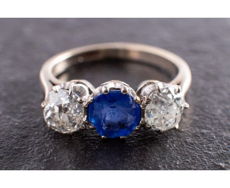 A sapphire and cushion-cut diamond, three-stone ring, total estimated sapphire weight ca. 1.05ct, total estimated diamond wei