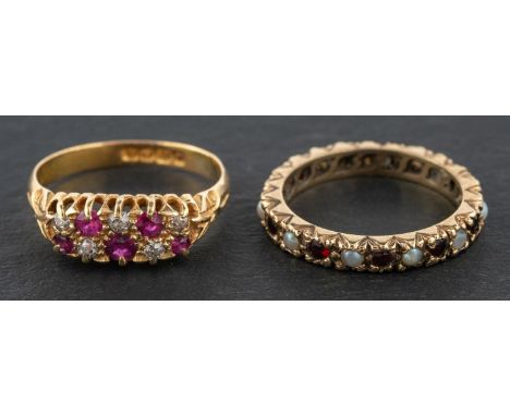 An Edwardian, 18ct gold, ruby and old-cut diamond two-row ring, total estimated diamond weight ca. 0.10ct, with hallmarks for