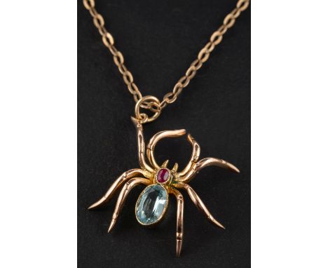 An aquamarine and ruby spider pendant, estimated aquamarine weight ca. 0.50ct, together with a belcher-link chain, stamped '9