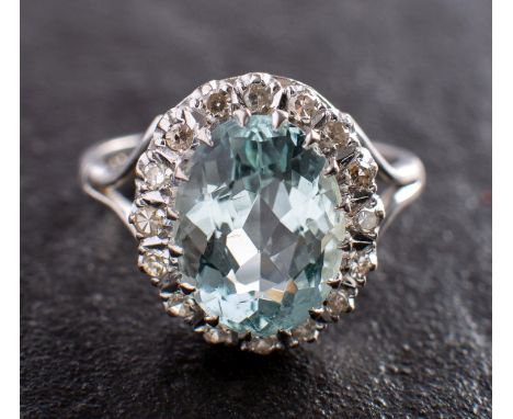 An aquamarine and single-cut diamond cluster ring, estimated aquamarine weight ca. 3.50cts, total estimated diamond weight ca
