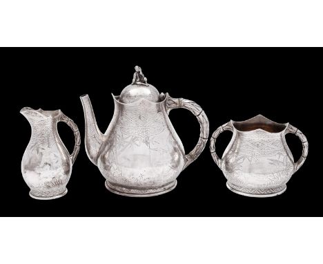 An Aesthetic movement silver three-piece tea service, maker Elkington & Co, London, 1879 of ovoid form, with engraved decorat