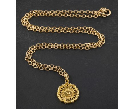 A pendant depicting the zodiac sign of cancer, with Moroccan control stamps for 18ct gold, together with a belcher-link chain