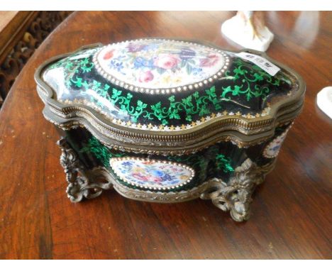 A French enamel casket of quatrefoil form, green ground with inset floral painted oval panels, gilt metal mounts