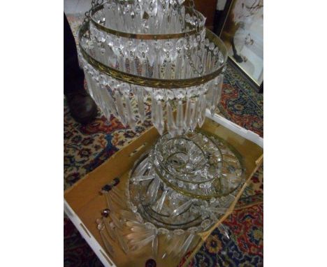 Three small circular basket form light fittings with icicle form drops