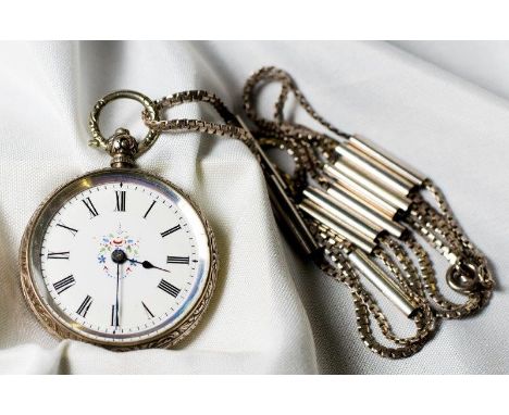 A lady's openface fob watch with white enamel dial, in an engraved Continental silver case, on a silver chain