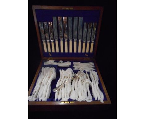 A canteen of silver plated flatware, place settings for six