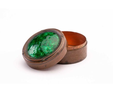 Guild of Handicrafts Ltd, a small Arts &amp; Crafts copper and enamel cylindrical box, the cover set with green enamel decora