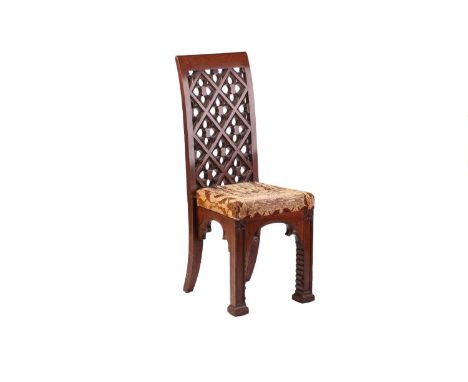 L&amp;A Blain of Liverpool; a 19th-century gothic mahogany high-back reclining chair, the shaped back pierced with gothic tra