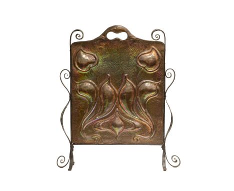 An Arts &amp; Crafts beaten copper and wrought iron firescreen in the manner of J.S. Sankey of Wolverhampton, embossed with a