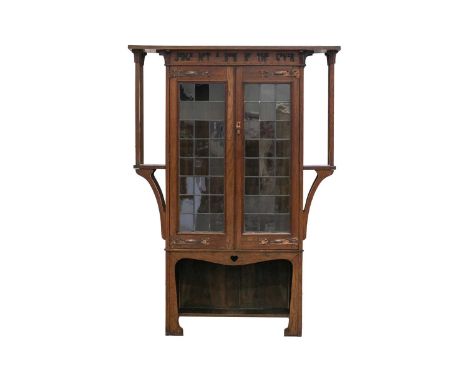 Possibly Maple &amp; Co for Liberty, an oak Arts &amp; Crafts "Judge Not A Book By The Cover" bookcase, the overhanging top s