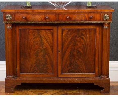 A MAHOGANY AND PARCEL GILT SIDE CABINET, LATE 19th CENTURY, with two frieze drawers, above a pair of panel doors, flanked by 