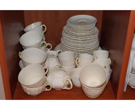 A quantity of Beleek ware...... period, comprising teacups, saucers, cream jugs etc. 