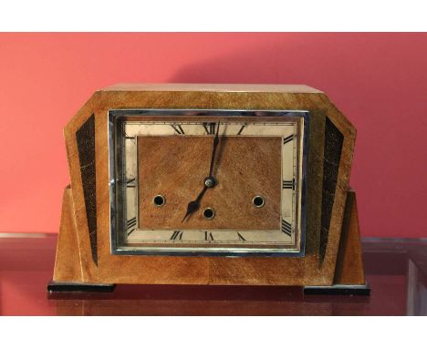 AN ART DECO MANTLE CLOCK, 35cm wide x 22cm high.