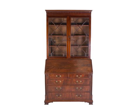 A COMPOSED GEORGIAN MAHOGANY SECRETAIRE CABINET, BASICALLY 18th CENTURY the broken pedimented top with dentil cornice, above 