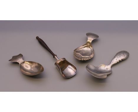 Four silver caddy spoons. 33.3 grammes total weight.