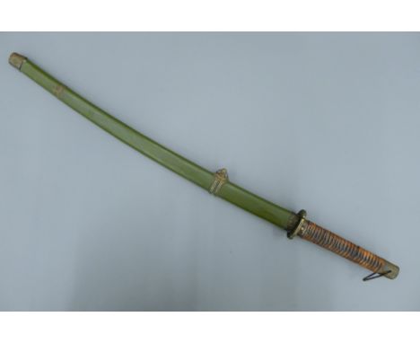 A 20th century Japanese Katana sword, in painted metal scabbard. 93 cm long overall.