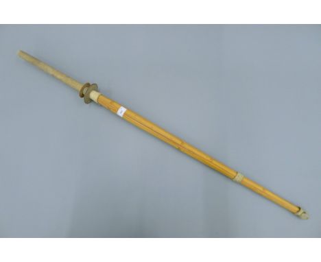 A vintage bamboo Kendo stick. 116 cm long.