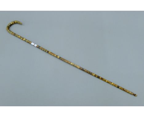 A Victorian horn segmented walking stick. 90 cm long.