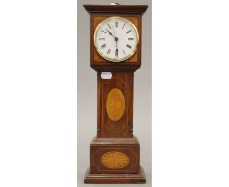 A mahogany miniature longcase clock. 41 cm high.