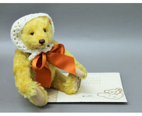 A Steiff musical teddy bear.