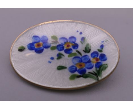 A David Anderson enamel oval flower brooch. 2.5 cm wide.