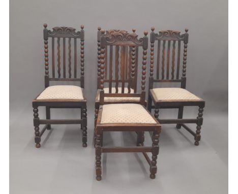 A set of four early 20th century oak bobbin twist chairs. 46 cm wide.