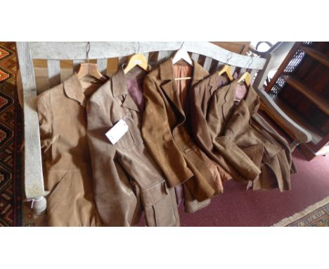 A collection of five vintage men's suede jackets. 
