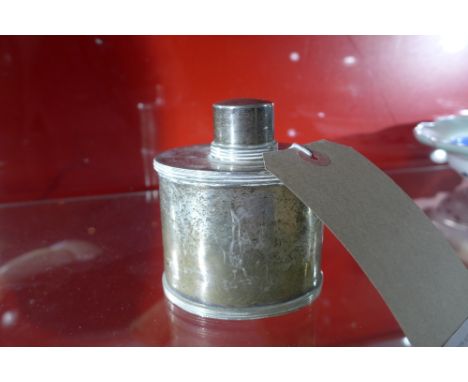 A Georgian silver tea caddy of oval form dated 1783 and designed by Andrew Fogelberg