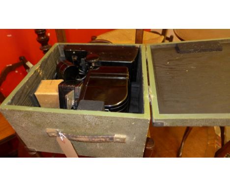 A 1940's projector 'G B Model 38' in original green painted case, H:36cm W:34cm D:22cm