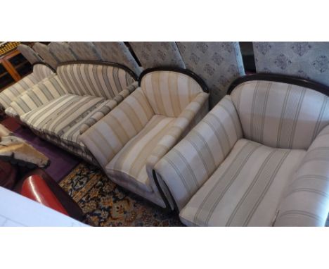 A French Art Deco four piece suite upholstered ivory fabric, consisting of a three piece sofa, H;52cm W:180cm D:77cm together