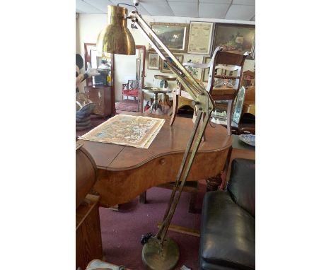 A large contemporary floor standing angle poise lamp. 