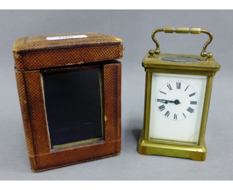 Brass carriage clock with leather carry case, 15cm high including handle
