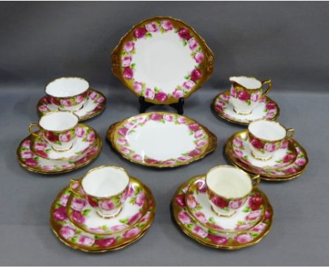 Royal Albert Crown china 'Rose' patterned teaset to include six cups, twelve saucers, twelve side plates, two cake plates, cr