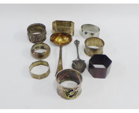 A collection of silver, pewter and Epns napkin rings together with a Continental silver sauce ladle and spoon etc (a lot) 