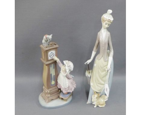 Two Lladro figures to include a Girl and Longcase Clock and another of a Lady with a Parasol, tallest 36cm high, (2) 