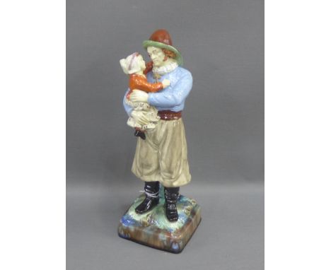 Victorian W &amp; R glazed figure of a man and a child on a square plinth base, 29cm high 