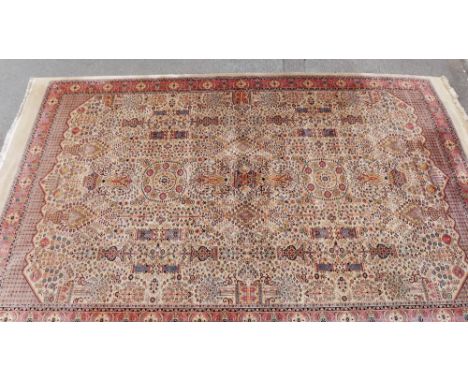 Large Persian style carpet with allover foliate design, 590 x 340cm 