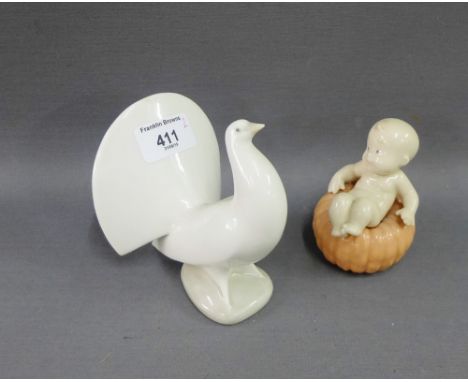 Two Nao figures to include a Baby on a Pumpkin and a Dove, (2) 