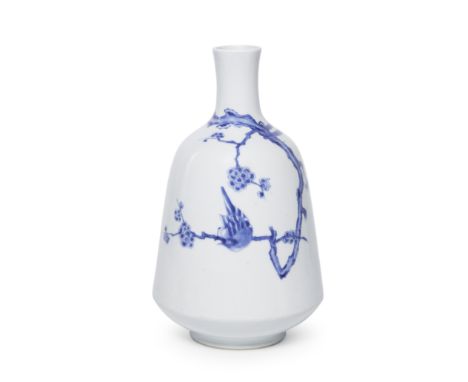 A blue and white 'Magpie and Prunus' bottle vaseKangxi (1662-1722)The bell-shaped body rising from a short narrow foot to a l