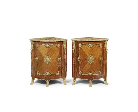 A fine pair of late Louis XV ormolu mounted tulipwood, purplewood and kingwood encoignuresMade by Bon Durand, third quarter 1