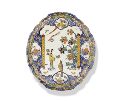 A Dutch Delftware plaque, circa 1760Decorated with a chinoiserie figure in long flowing robes and stylised landscapes with ro