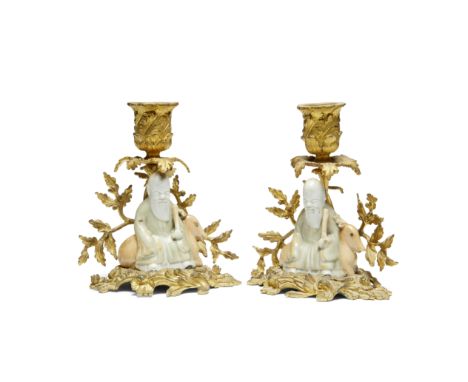 A pair of French ormolu-mounted Chinese porcelain figures of Shou LaoThe figures early 18th century, the mounts probably mid-