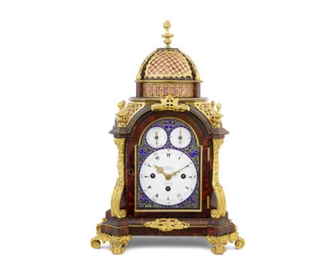 A fine mid 18th century gilt-metal mounted tortoiseshell musical table clock with silver and champlevé enamel decorated dial 