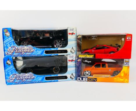 Maisto - Jada - 4 x boxed models, Hummer H2 and Lamborghini Gallardo in 1:18 scale, and a Toyota Celica and Chevy Silverado i