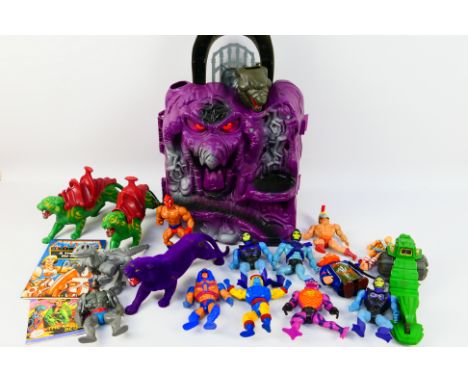 Mattel - He-Man - A collection of He-Man figures with a Snake Mountain play set. Includes 3 x Battle Cats, a Road Ripper, and