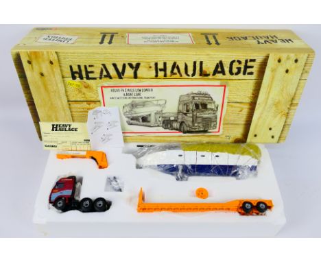 Corgi Heavy Haulage - A boxed Corgi Heavy Haulage Limited Edition CC12413 Volvo FH 2 Axle Low Loader & Boat Load 'Van De Wete